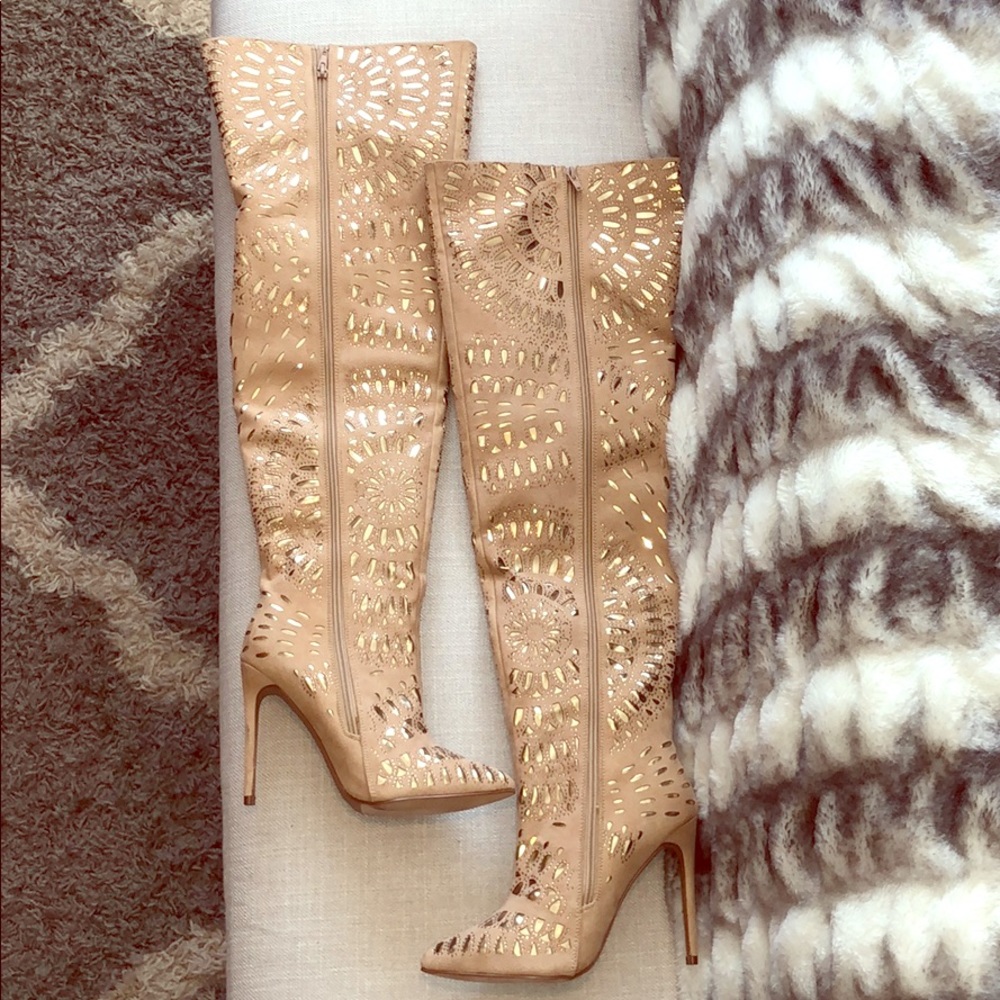 Brand new thigh high boots.